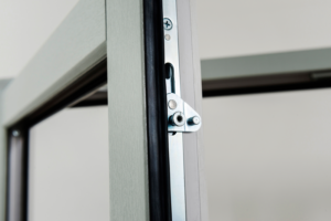 Multi-point locking securing all four sides of the sash